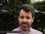 Image of man in chequered shirt with caption saying Tom Bennett, Scottish Recovery Consortium